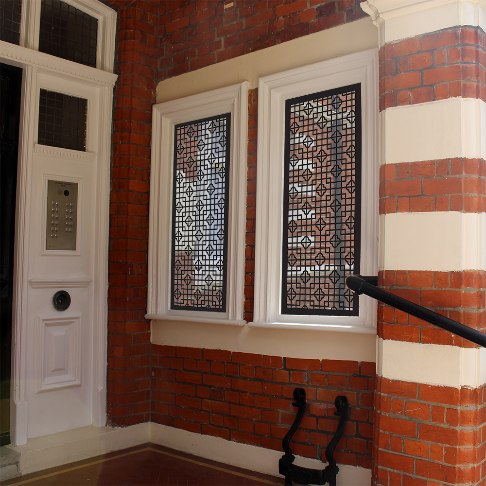 BAKER ST Laser cut window security screens in door entrance