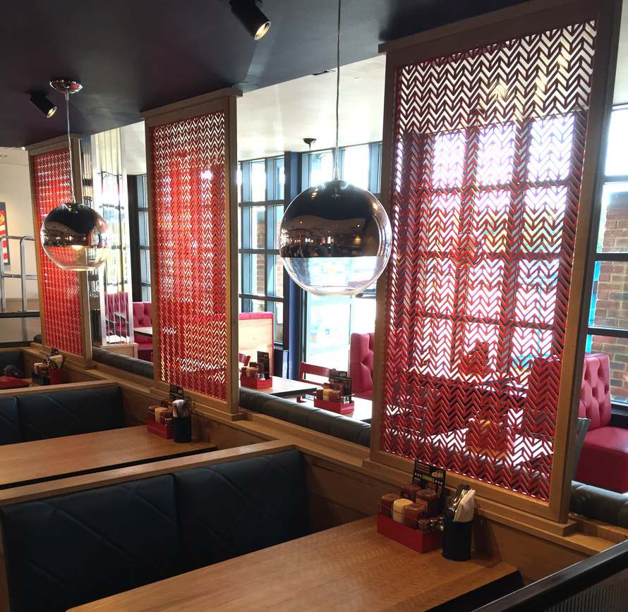 Laser cut screens in Chevron design for Pizza Hut UK