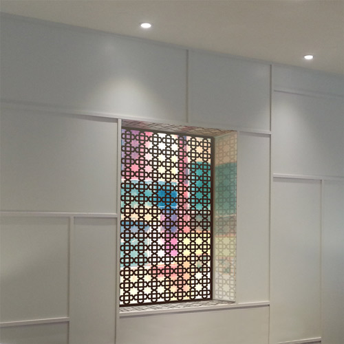 wall panels with lights in arabic pattern