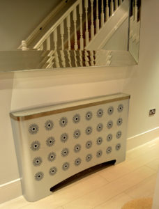 Stylish hallway radiator covers in galvanised modern designs