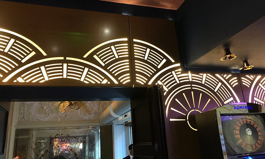 Hippodrome casino london laser cut metal wall screen with illuminated white lighting