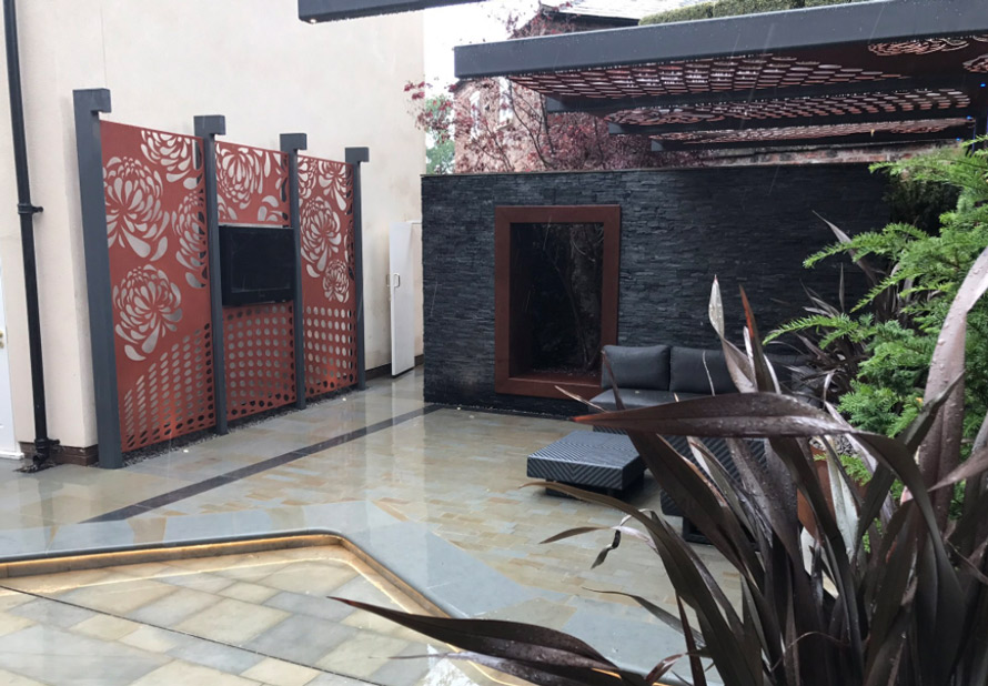 custom made garden pergola panels with Black TV in copper metallic colours