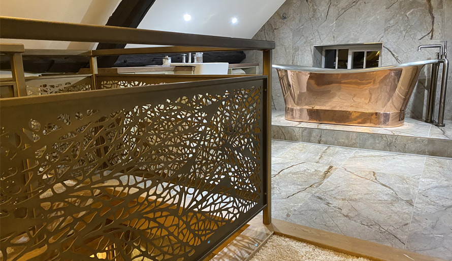 Laser cut balustrade in antique brass