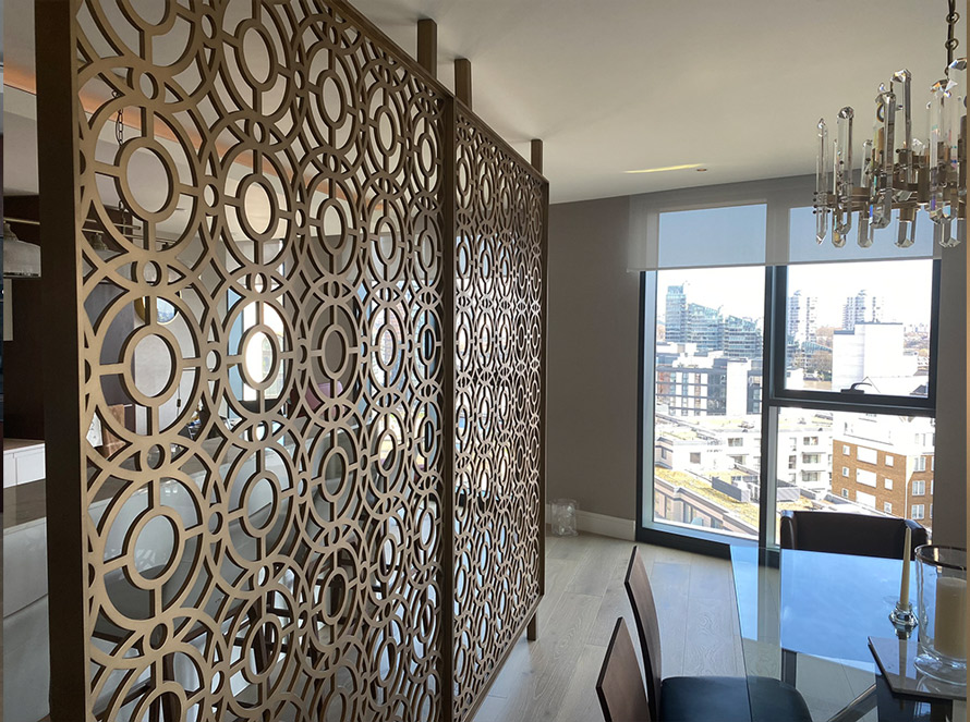 Brass room dividers in high rise apartment