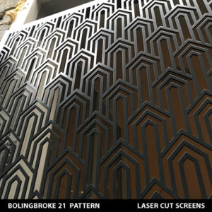 Art deco tower pattern on metal gate in dark grey colour