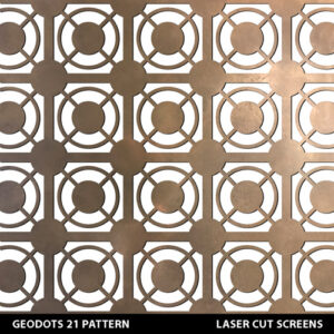 Modern geometric style laser cut fretwork design with circles and dots in gold colour on white wall