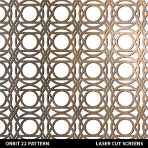 Orbit pattern laser cut metal fretwork in gold brass colour on white wall