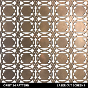 Orbit design laser cut metal fretwork in gold brass colour on white wall