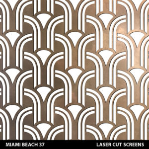 Art deco South Beach Miami laser cut screen pattern in brass colour on white wall