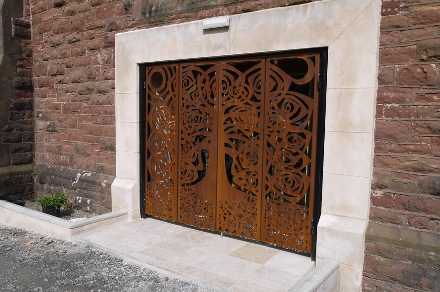 Peel Cathedral bi fold corten steel doors